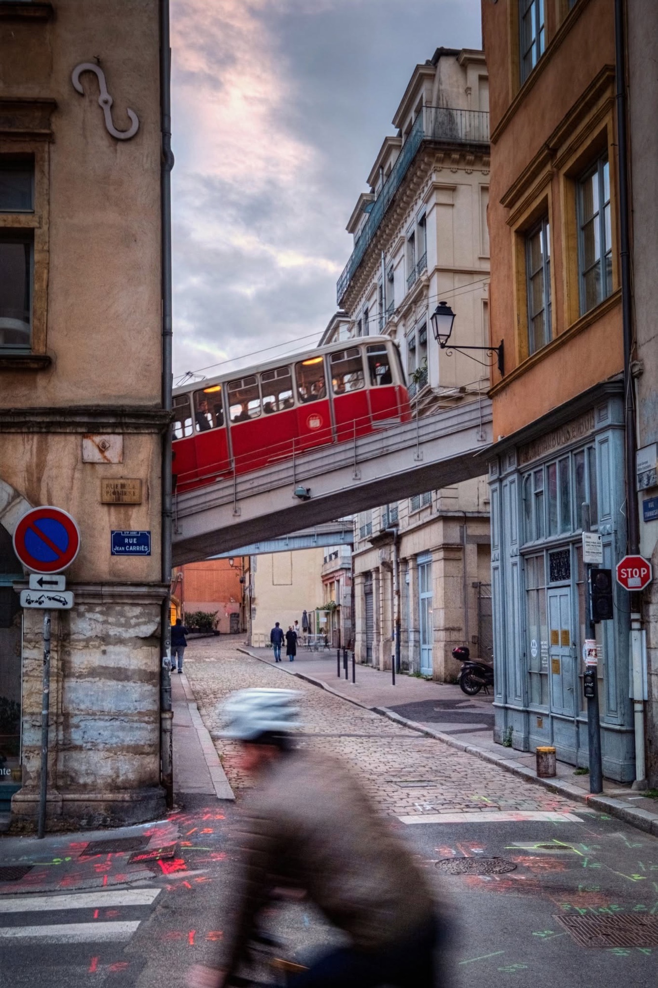 Funicular crossing a Vieux Lyon street