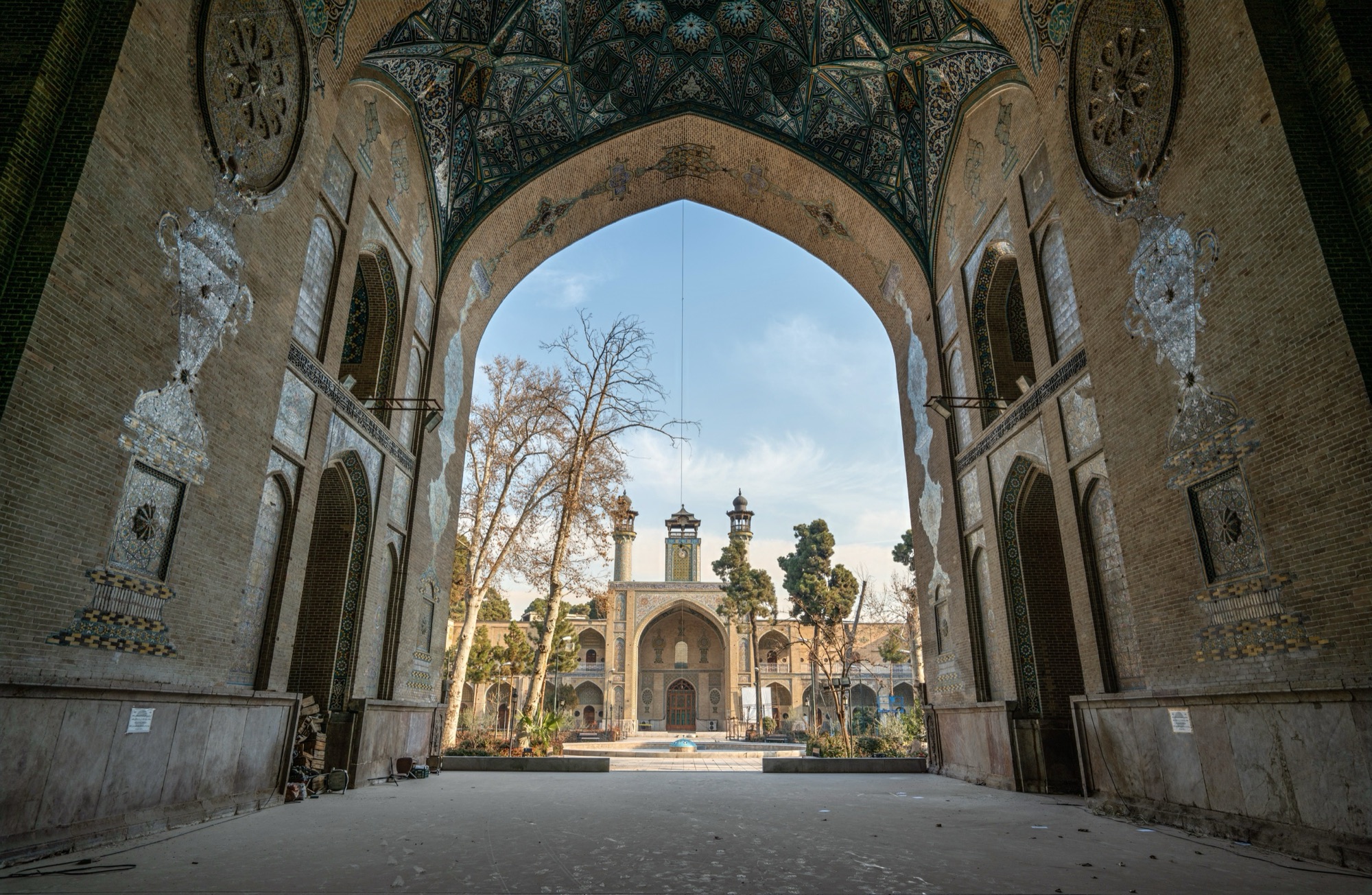 Courtyard through an entrance iwan — probably Sepahsalar (Shahid Motahari) mosque-school